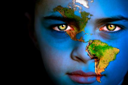 person with face painted like the earth