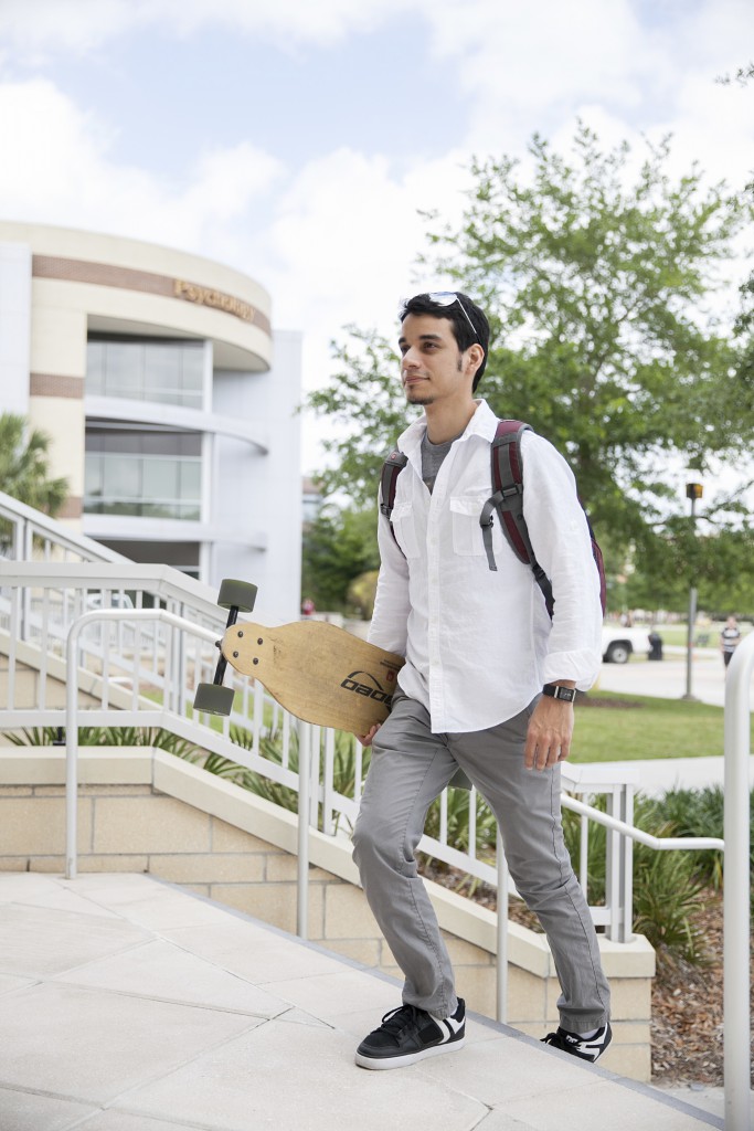 Male student walks to class