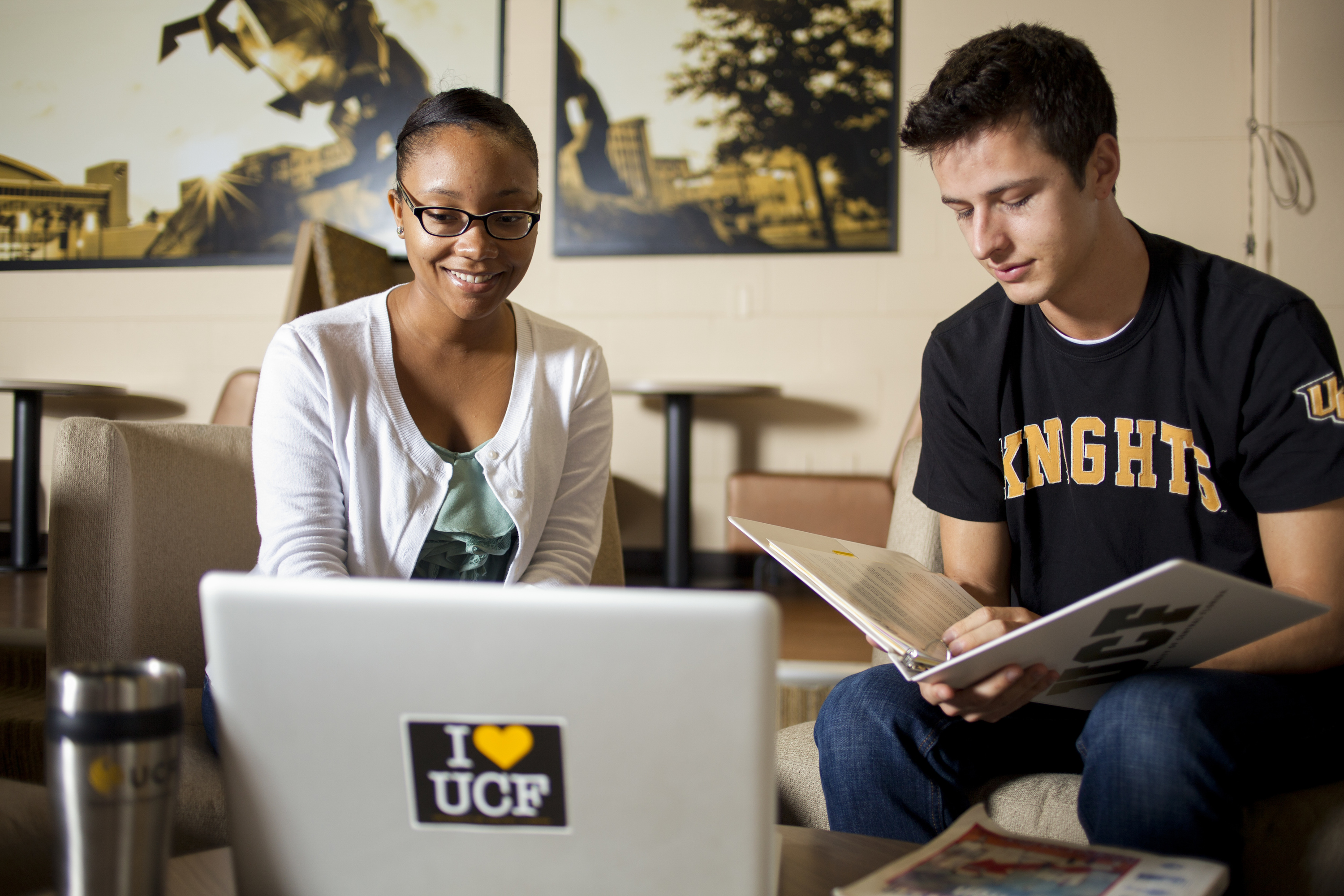 Two students talking in Farrell Commons Two students talking in Farrell Commons