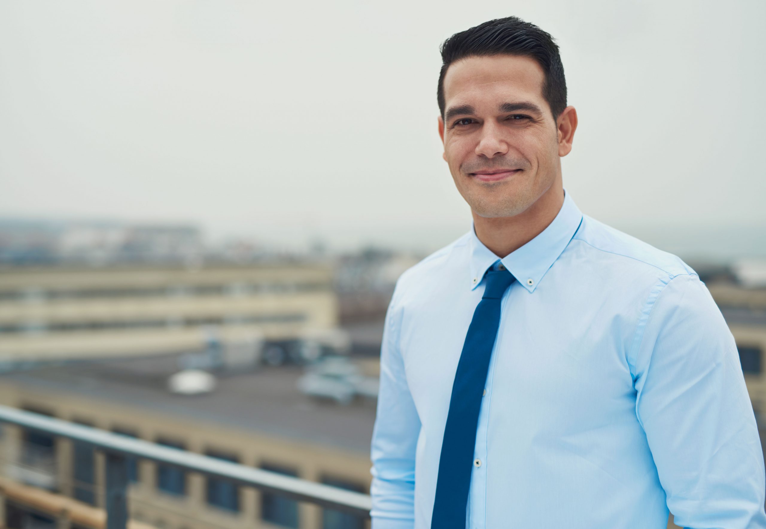 smiling-relaxed-hispanic-businessman-2021-08-26-17-26-56-utc Hispanic businessman