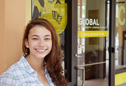 DSC_0620 UCF Student in front of UCF Global Building
